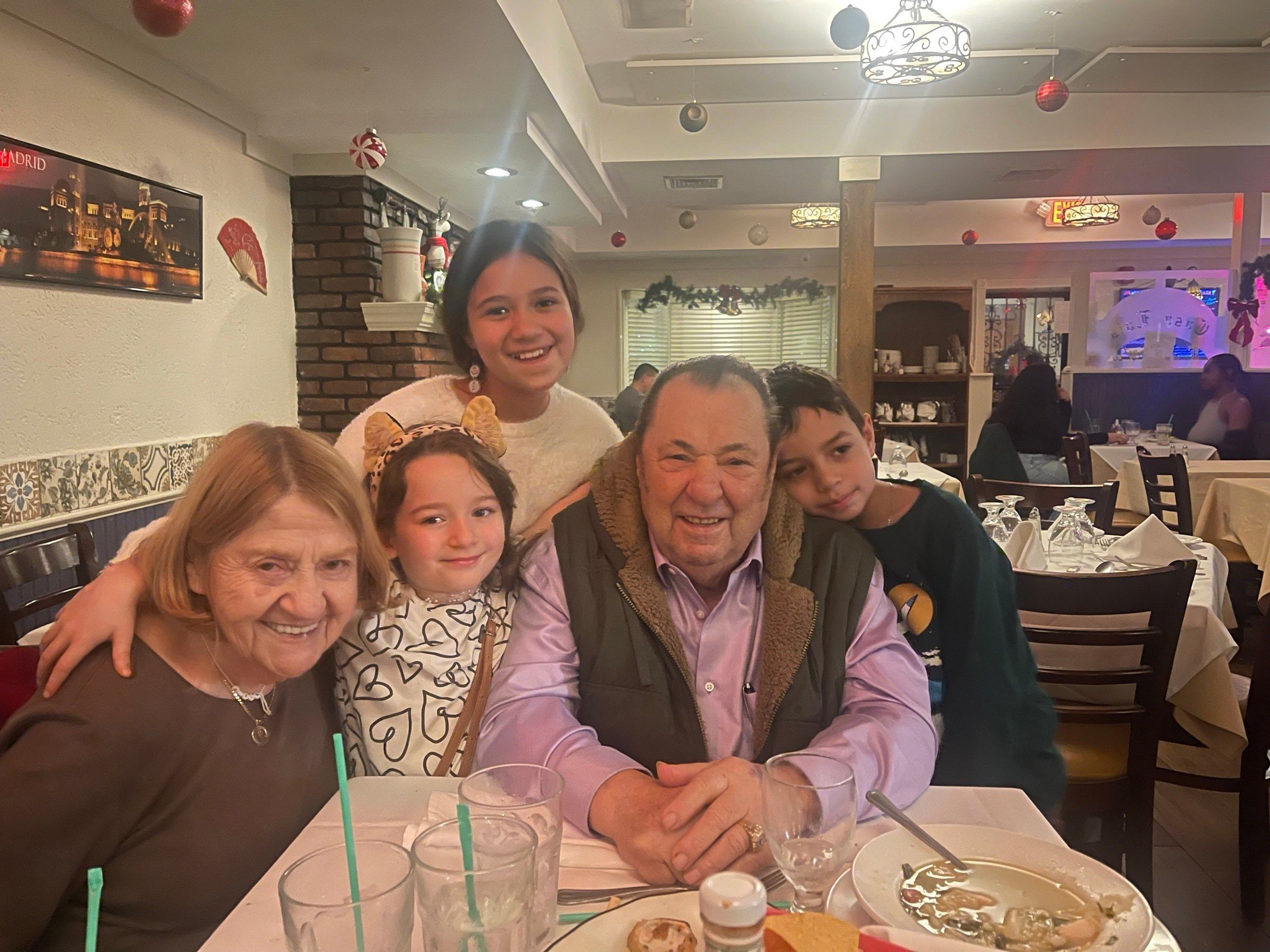 Carmen and Luis with their grandchildren at Casa Luis