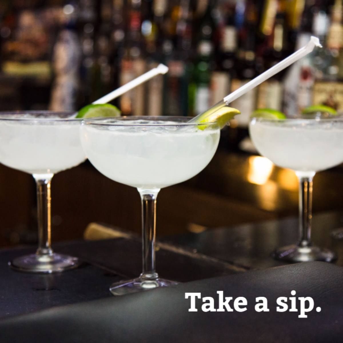 Three margaritas on the bar