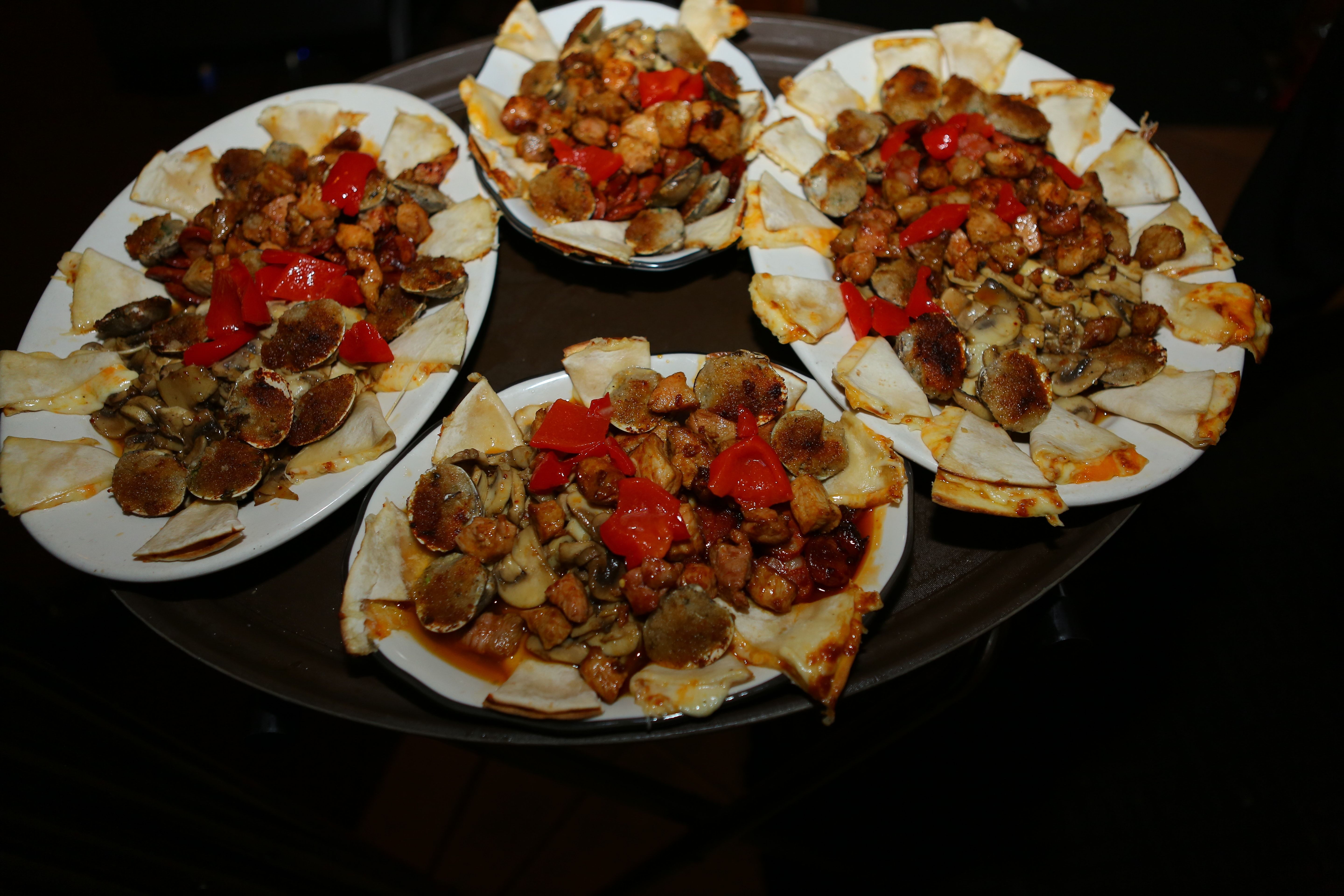 A platter of tapas served family style